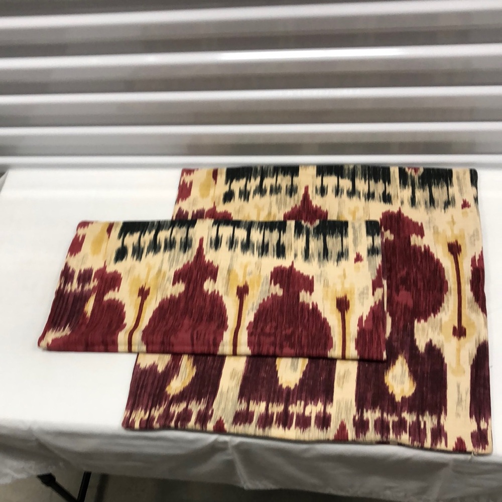 Pottery Barn Burgundy and Cream Ikat Square Euro Pillow Covers.